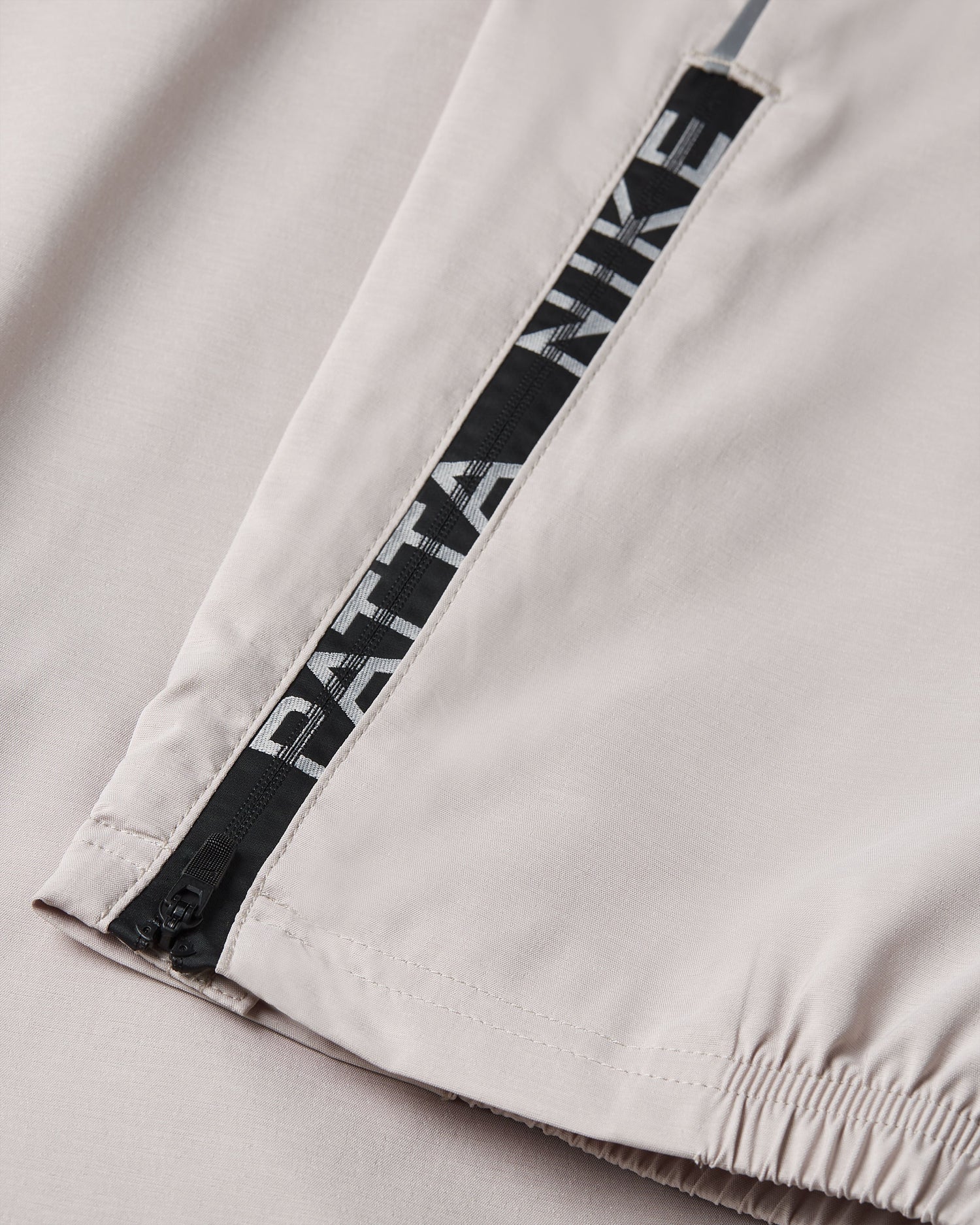 Nike x Patta Running Team Track Pants (Sanddrift/Cream II) – Patta US