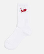 White Patta sports socks with haute red patta script logo